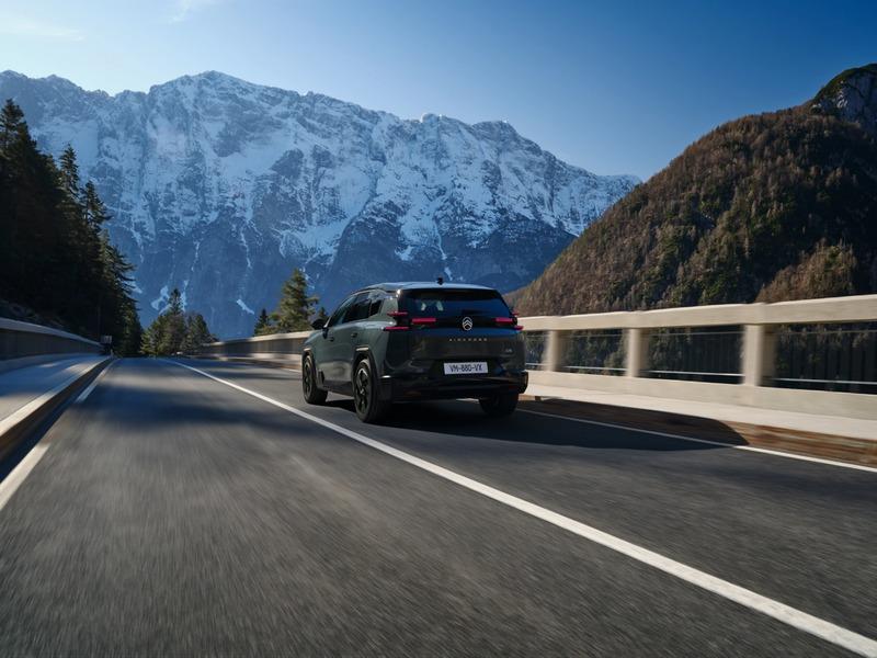 suv_driving_mountain_highway.jpg