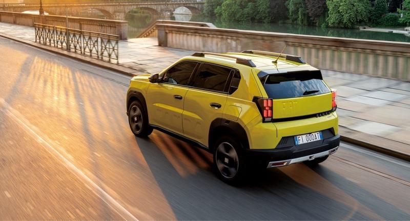 yellow_fiat_suv_driving_riverside.jpg